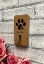 Load image into Gallery viewer, Personalised Solid Oak Lead Hanger With Cut Out Paw Print